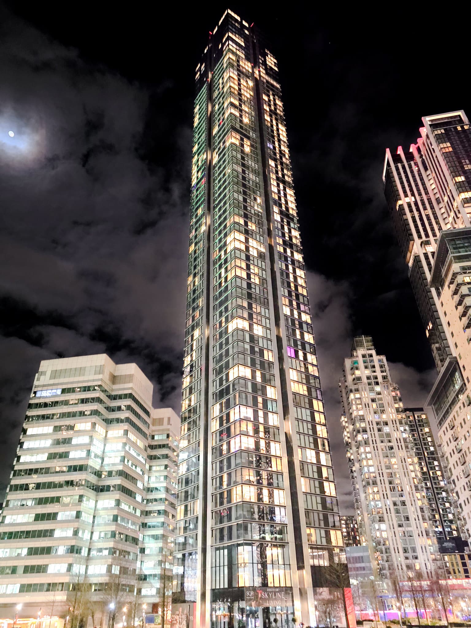 A standard dynamic range photo of a tower against night sky.